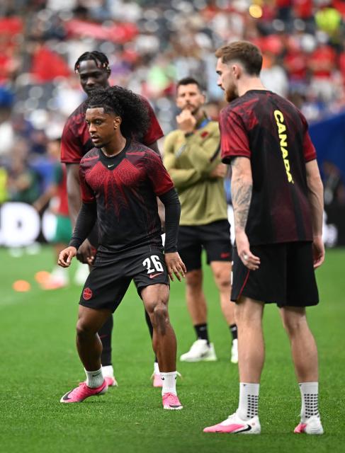 Canada's forward #26 Jayden Nelson warms up ahead of the 2026 World Cup round of 16 football match between Canada and Morocco at the Houston Stadium in Houston on July 4, 2026.  (Photo by Paul ELLIS / AFP)