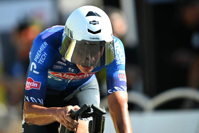 Alpecin - Premier Tech team's Dutch rider Mathieu van der Poel cycles to the finish line of the 1st stage of the 113th edition of the Tour de France cycling race, a 19,6 km team time trial stage in and around Barcelona in northeastern Spain, on July 4, 2026. (Photo by Loic VENANCE / AFP)