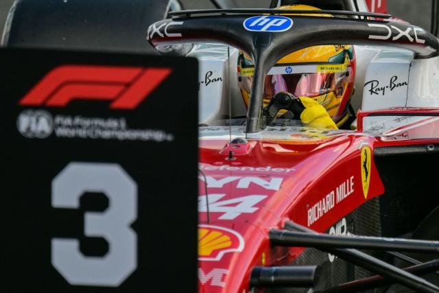 Ferrari's Monegasque driver Charles Leclerc comes in after finishing with the second fastest time in the qualifying session ahead of the Formula One British Grand Prix at the Silverstone motor racing circuit in Silverstone, central England, on July 4, 2026. (Photo by Andrej ISAKOVIC / AFP)