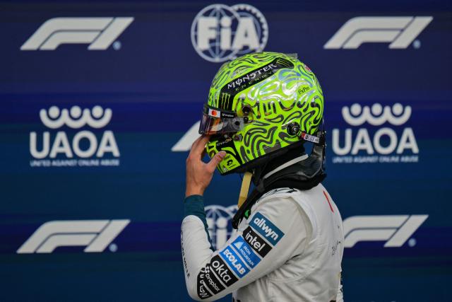 McLaren's British driver Lando Norris returns after taking part in the qualifying session ahead of the Formula One British Grand Prix at the Silverstone motor racing circuit in Silverstone, central England, on July 4, 2026. (Photo by Andrej ISAKOVIC / AFP)