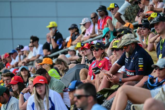 Spectators watch the action during the qualifying session ahead of the Formula One British Grand Prix at the Silverstone motor racing circuit in Silverstone, central England, on July 4, 2026. (Photo by Andrej ISAKOVIC / AFP)