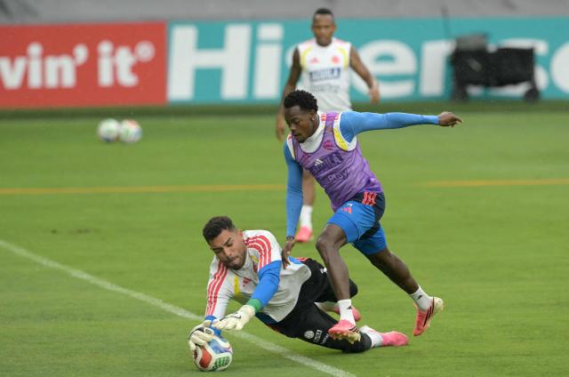 Colombia's goalkeeper #24 Alvaro Montero and Colombia's forward #26 Andres Gomez take part in a training session at the Sporting KC Stadium in Kansas City on July 4, 2026, during the 2026 World Cup tournament. (Photo by JUAN MABROMATA / AFP)