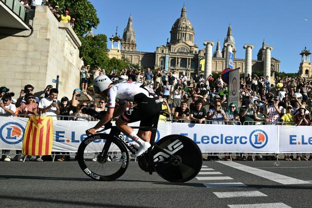 UAE Team Emirates - XRG's Slovenian rider Tadej Pogacar cycles next to the Palau nacional ('National Palace')  on the hill of Montjuic during the 1st stage of the 113th edition of the Tour de France cycling race, a 19,6 km team time trial stage in and around Barcelona in northeastern Spain, on July 4, 2026. (Photo by Jeff PACHOUD / AFP)