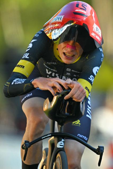 Team Visma | Lease a Bike's Danish rider Jonas Vingegaard cycles to the finish line of the 1st stage of the 113th edition of the Tour de France cycling race, a 19,6 km team time trial stage in and around Barcelona in northeastern Spain, on July 4, 2026. (Photo by Loic VENANCE / AFP)
