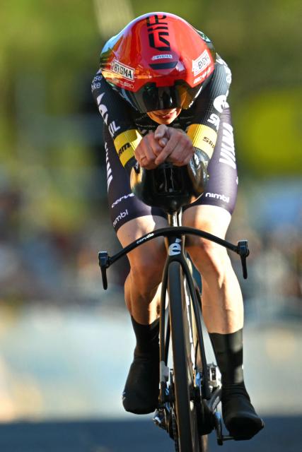 Team Visma | Lease a Bike's Danish rider Jonas Vingegaard cycles to the finish line of the 1st stage of the 113th edition of the Tour de France cycling race, a 19,6 km team time trial stage in and around Barcelona in northeastern Spain, on July 4, 2026. (Photo by Loic VENANCE / AFP)