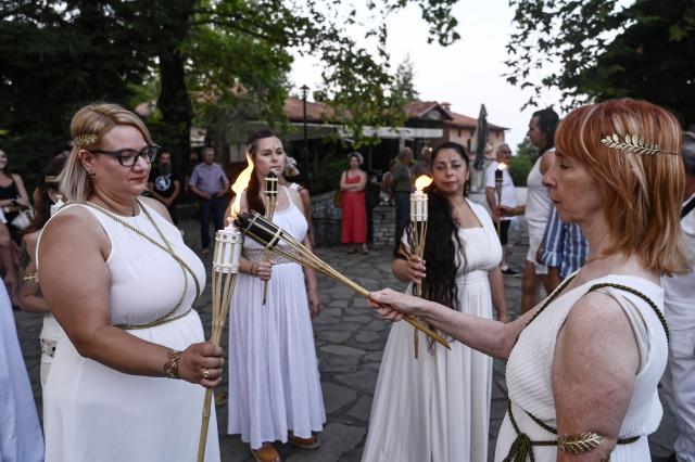 Reenactors dressed as ancient Greeks perform a ritual as part of the four-day Promitheia Festival honouring ancient Greek Gods, in Litochoro, northern Greece, on July 3, 2026. (Photo by Sakis Mitrolidis / AFP)