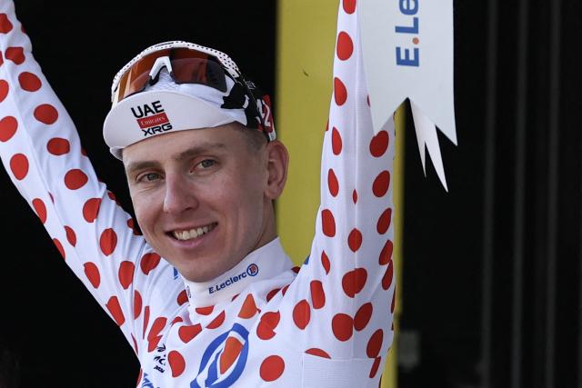 UAE Team Emirates - XRG's Slovenian rider Tadej Pogacar celebrates on the podium with the best climber's polka dot (dotted) jersey after the 1st stage of the 113th edition of the Tour de France cycling race, a 19,6 km team time trial stage in and around Barcelona in northeastern Spain, on July 4, 2026. (Photo by Anne-Christine POUJOULAT / AFP)