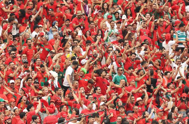 Moroccan fans celebrate their team's second goal during the 2026 World Cup round of 16 football match between Canada and Morocco at the Houston Stadium in Houston on July 4, 2026.  (Photo by Thomas COEX / AFP)