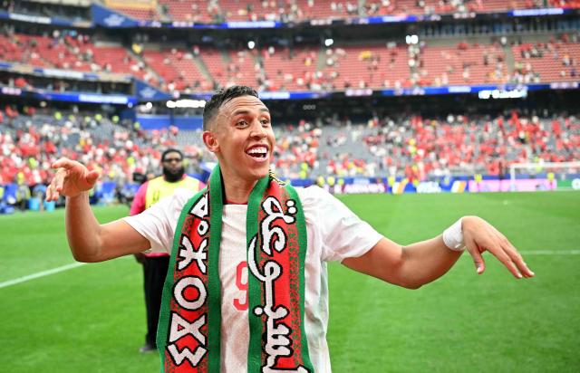 Morocco's forward #09 Soufiane Rahimi celebrates after winning the 2026 World Cup round of 16 football match between Canada and Morocco at the Houston Stadium in Houston on July 4, 2026.  (Photo by RONALDO SCHEMIDT / AFP)