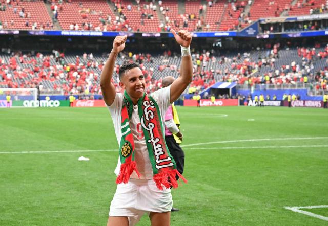 Morocco's forward #09 Soufiane Rahimi celebrates after winning the 2026 World Cup round of 16 football match between Canada and Morocco at the Houston Stadium in Houston on July 4, 2026.  (Photo by RONALDO SCHEMIDT / AFP)