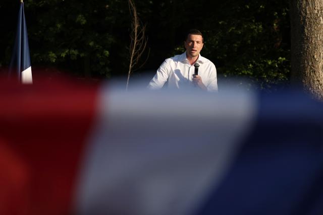French far-right party Rassemblement National (RN) president Jordan Bardella addresses the audience during a RN party event "La fete champetre" in Lievin, northern France on July 4, 2026. (Photo by SIMON WOHLFAHRT / AFP)