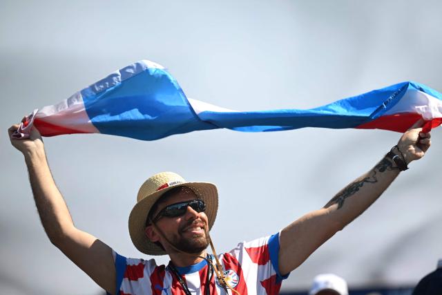 A Paraguay fan cheers ahead of the 2026 World Cup football tournament round of 16 match between Paraguay and France at Philadelphia Stadium in Philadelphia on July 4, 2026.  (Photo by MAURO PIMENTEL / AFP)