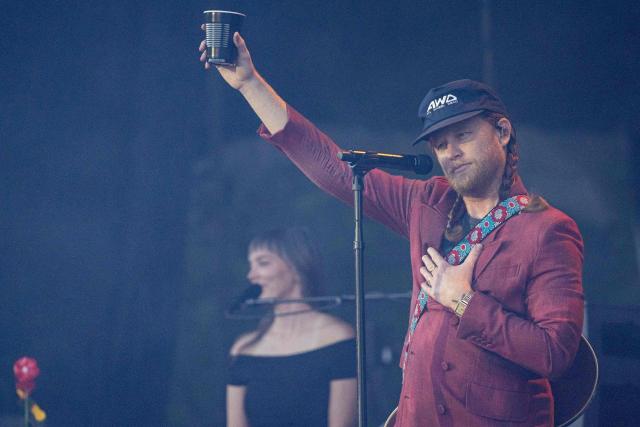 Singer Wesley Schultz of US folk band ‘The Lumineers’ gestures as he performs on stage during the 36th edition of the Les Eurockeennes de Belfort music festival, in Sermamagny, eastern France, on July 4, 2026. (Photo by ROMEO BOETZLE / AFP)