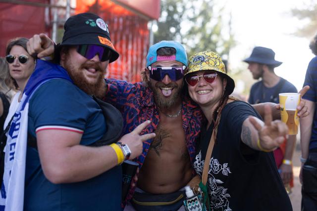 Festivalgoers pose for a photograph during the 36th edition of the Les Eurockeennes de Belfort music festival, in Sermamagny, eastern France, on July 4, 2026. (Photo by ROMEO BOETZLE / AFP)