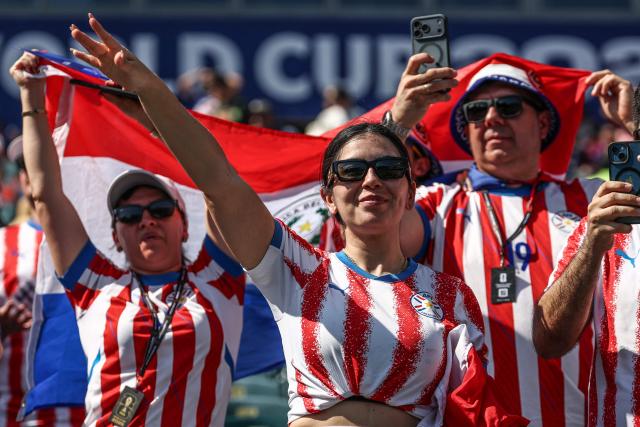 Paraguay supporters cheer prior to the 2026 World Cup round of 16 football match between Paraguay and France at the Philadelphia Stadium in Philadelphia on July 4, 2026.  (Photo by FRANCK FIFE / AFP)