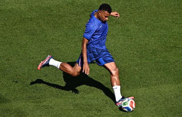 France's forward #10 Kylian Mbappe warms up ahead of the 2026 World Cup round of 16 football match between Paraguay and France at the Philadelphia Stadium in Philadelphia on July 4, 2026.  (Photo by Jewel SAMAD / AFP)