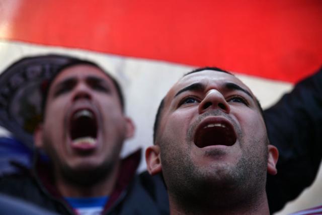 Paraguay supporters react as they watch the FIFA World Cup 2026 round-of-16 football match between Paraguay and France in Asuncion on July 4, 2026. (Photo by DANIEL DUARTE / AFP)