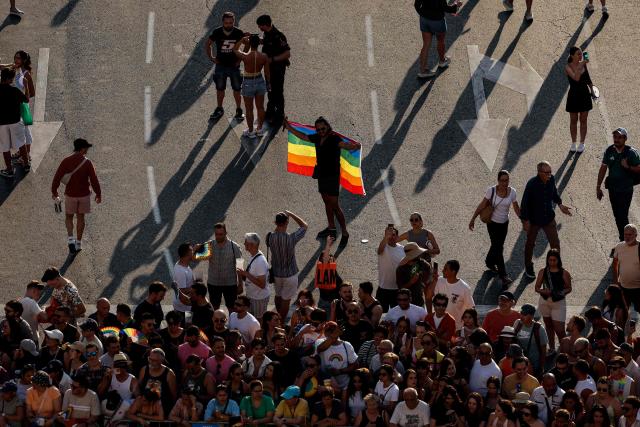 Aerial view of participants attending the LGBTIQ (lesbian, gay, bisexual, transgender, intersex and queer) Pride parade in Madrid, on July 04, 2026. (Photo by OSCAR DEL POZO / AFP)