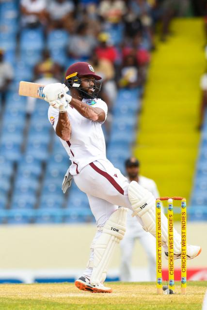John Campbell of West Indies hits 6 during the second day of the second Test cricket match between West Indies and Sri Lanka at Sir Vivian Richards Stadium in North Sound, Antigua and Barbuda, on July 4, 2026. (Photo by Randy Brooks / AFP)