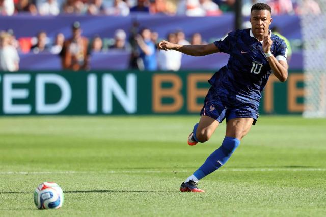 France's forward #10 Kylian Mbappe runs for the ball during the 2026 World Cup round of 16 football match between Paraguay and France at the Philadelphia Stadium in Philadelphia on July 4, 2026.  (Photo by Odd ANDERSEN / AFP)