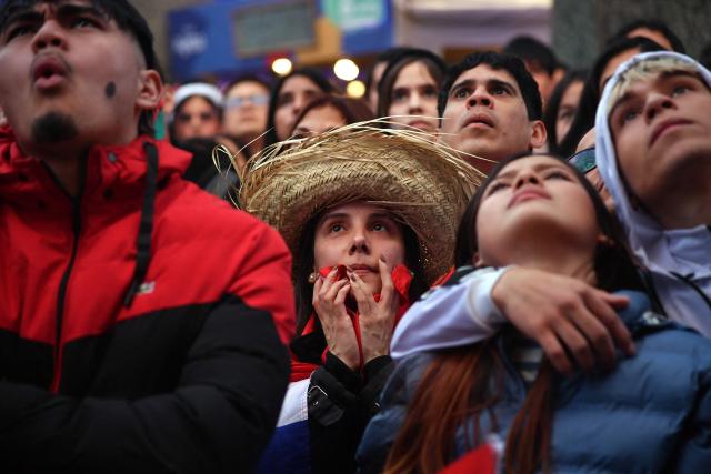 Paraguay supporters react as they watch the FIFA World Cup 2026 round-of-32 football match between Paraguay and France in Asuncion on July 4, 2026. (Photo by DANIEL DUARTE / AFP)