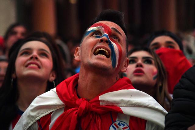 Paraguay supporters react as they watch the FIFA World Cup 2026 round-of-32 football match between Paraguay and France in Asuncion on July 4, 2026. (Photo by DANIEL DUARTE / AFP)