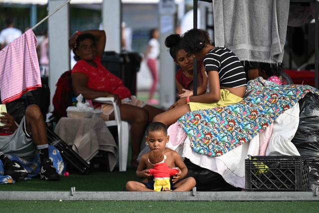 Displaced people take shelter at the Jose Maria Vargas sports complex domo in Maiquetia, La Guaira state, Venezuela, on July 3, 2026, following the June 24 twin earthquakes. The death toll from Venezuela's devastating twin earthquakes has risen to 2,954, according to official figures released on Saturday. (Photo by Raul ARBOLEDA / AFP)