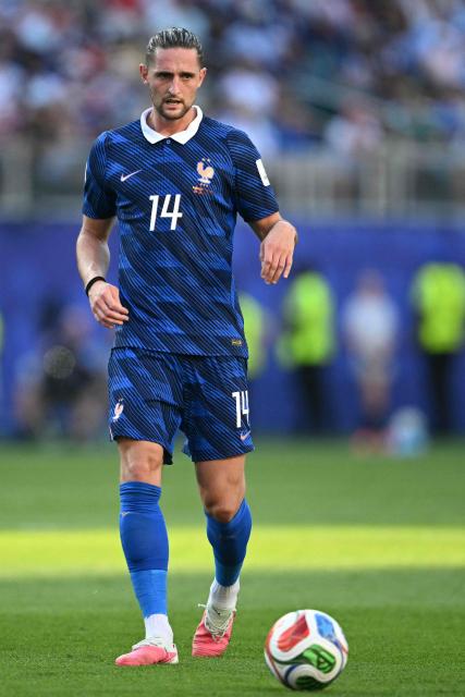 France's midfielder #14 Adrien Rabiot controls the ball during the 2026 World Cup round of 16 football match between Paraguay and France at the Philadelphia Stadium in Philadelphia on July 4, 2026.  (Photo by MAURO PIMENTEL / AFP)