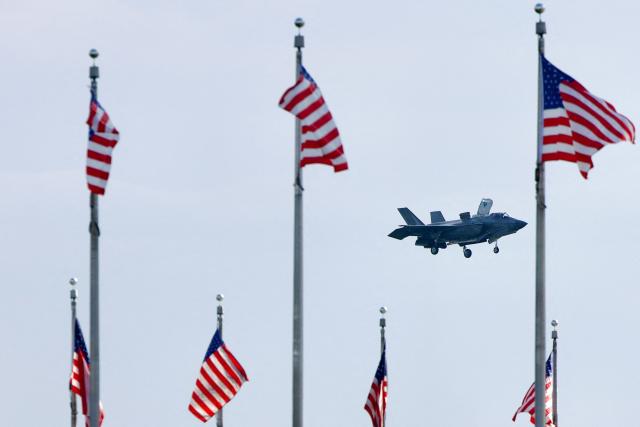 A US military F-35B Lightning II flies during the "Salute to America" Independence Day celebration on the National Mall in Washington, DC, on July 4, 2026. The nation is marking the 250th anniversary of the United States Declaration of Indpendence. (Photo by Amid FARAHI / AFP)