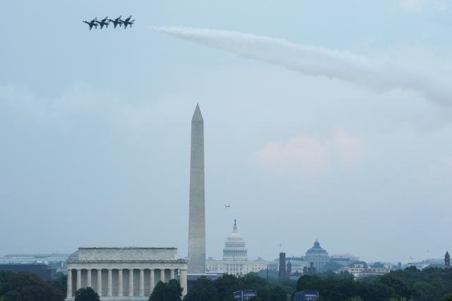 US Air Force Thunderbirds perform during the "Salute to America" Independence Day celebration on the National Mall in Washington, DC, on July 4, 2026. The nation is marking the 250th anniversary of the United States Declaration of Indpendence. (Photo by Ken Cedeno / AFP)