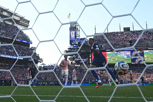 France's forward #10 Kylian Mbappe celebrates scoring his team's first goal during the 2026 World Cup round of 16 football match between Paraguay and France at the Philadelphia Stadium in Philadelphia on July 4, 2026.  (Photo by MAURO PIMENTEL / AFP)