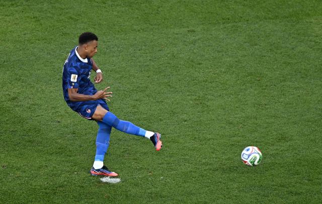 France's forward #10 Kylian Mbappe scores his team's first goal from the penalty spot during the 2026 World Cup round of 16 football match between Paraguay and France at the Philadelphia Stadium in Philadelphia on July 4, 2026.  (Photo by Jewel SAMAD / AFP)