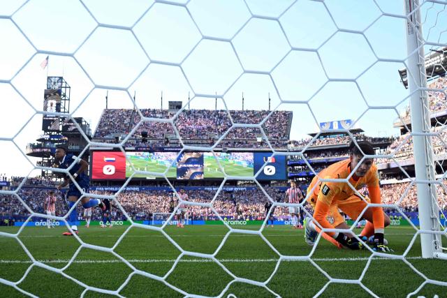 Paraguay's goalkeeper #12 Orlando Gill concedes France's first goal scored by forward #10 Kylian Mbappe during the 2026 World Cup round of 16 football match between Paraguay and France at the Philadelphia Stadium in Philadelphia on July 4, 2026.  (Photo by MAURO PIMENTEL / AFP)