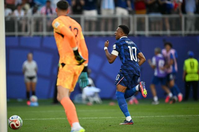 France's forward #10 Kylian Mbappe celebrates scoring his team's first goal during the 2026 World Cup round of 16 football match between Paraguay and France at the Philadelphia Stadium in Philadelphia on July 4, 2026.  (Photo by MAURO PIMENTEL / AFP)