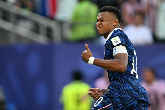 France's forward #10 Kylian Mbappe celebrates scoring his team's first goal during the 2026 World Cup round of 16 football match between Paraguay and France at the Philadelphia Stadium in Philadelphia on July 4, 2026.  (Photo by MAURO PIMENTEL / AFP)
