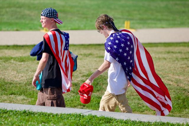 People arrive to attend the "Salute to America" Independence Day celebration on the National Mall in Washington, DC, on July 4, 2026. The nation is marking the 250th anniversary of the United States Declaration of Indpendence. (Photo by Amid FARAHI / AFP)