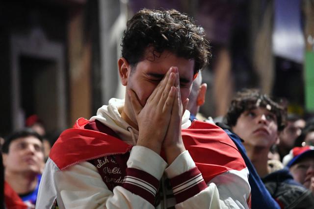 A Paraguay supporter reacts as he watches the FIFA World Cup 2026 round-of-32 football match between Paraguay and France in Asuncion on July 4, 2026. (Photo by DANIEL DUARTE / AFP)