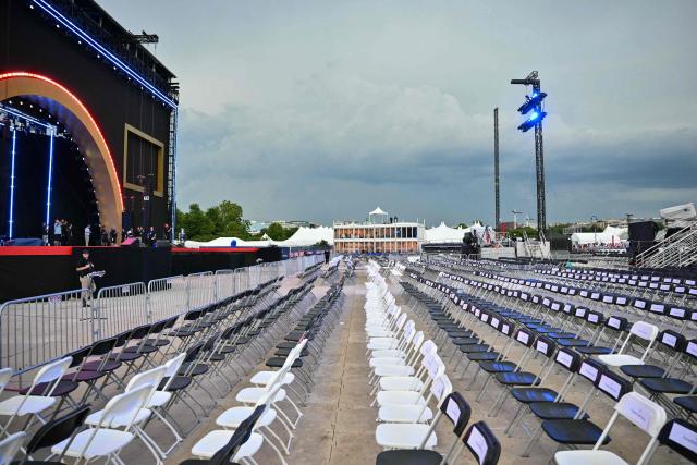Empty seats are seen after people were evacuated due to thunderstorms in the area during the "Salute to America" Independence Day celebration on the National Mall in Washington, DC, on July 4, 2026. The nation is marking the 250th anniversary of the United States Declaration of Indpendence. (Photo by Mandel NGAN / AFP)