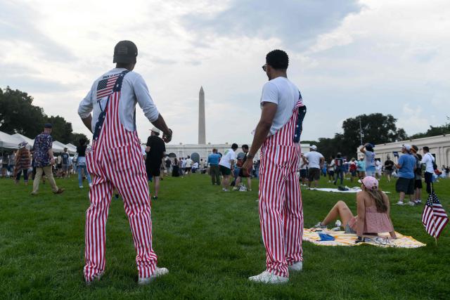 People attend the Great American State Fair during the "Salute to America" Independence Day celebration on the National Mall in Washington, DC, on July 4, 2026. The nation is marking the 250th anniversary of the United States Declaration of Indpendence. (Photo by Matthew HATCHER / AFP)