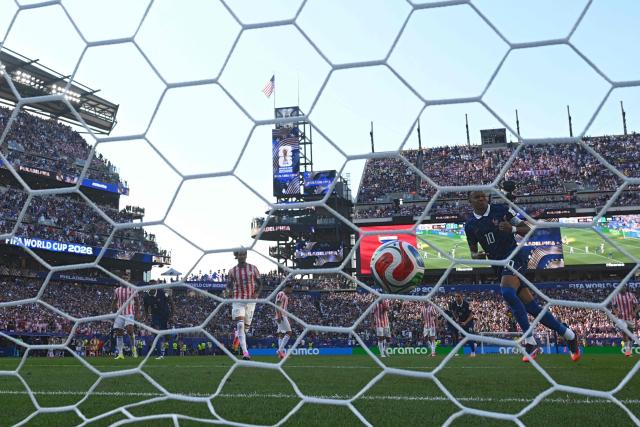 France's forward #10 Kylian Mbappe celebrates scoring his team's first goal during the 2026 World Cup round of 16 football match between Paraguay and France at the Philadelphia Stadium in Philadelphia on July 4, 2026.  (Photo by MAURO PIMENTEL / AFP)
