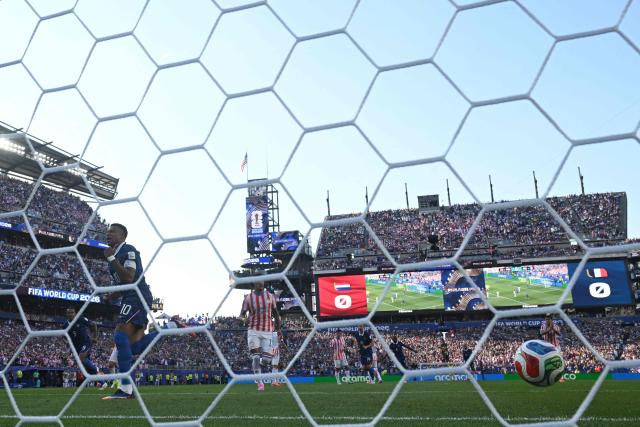 France's forward #10 Kylian Mbappe celebrates scoring his team's first goal during the 2026 World Cup round of 16 football match between Paraguay and France at the Philadelphia Stadium in Philadelphia on July 4, 2026.  (Photo by MAURO PIMENTEL / AFP)