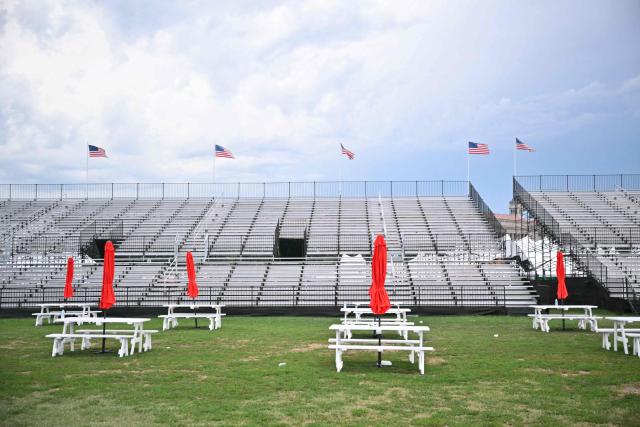 Empty bleachers are seen after people evacuated due to thunderstorms in the area during the "Salute to America" Independence Day celebration on the National Mall in Washington, DC, on July 4, 2026. The nation is marking the 250th anniversary of the United States Declaration of Indpendence. (Photo by Mandel NGAN / AFP)