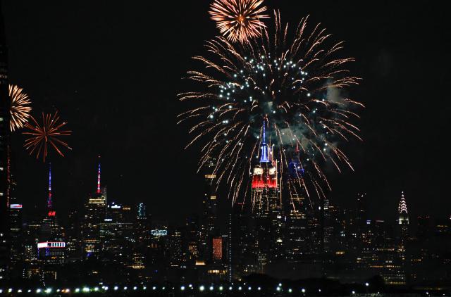 Fireworks light up the Manhattan skyline during the Macy's Fourth of July Fireworks celebration in New York City, as seen from Liberty State Park in Jersey City, New Jersey, on July 4, 2026. (Photo by kena betancur / AFP)