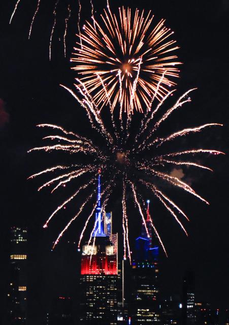 Fireworks light up the Manhattan skyline during the Macy's Fourth of July Fireworks celebration in New York City, as seen from Liberty State Park in Jersey City, New Jersey, on July 4, 2026. (Photo by kena betancur / AFP)