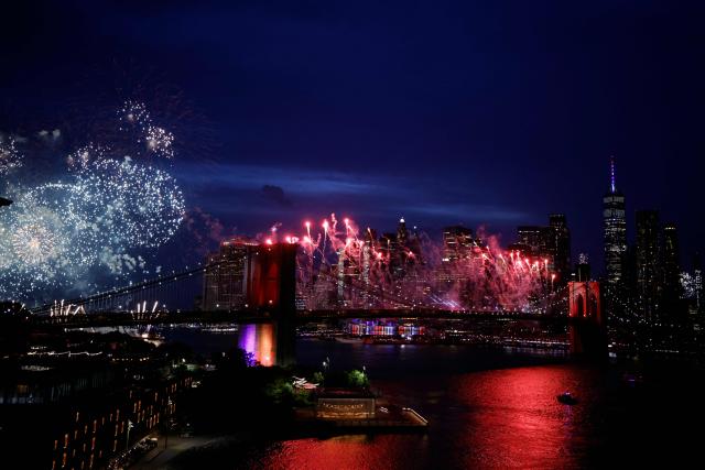 Fireworks light up the Brooklyn Bridge during the Macy's Fourth of July Fireworks celebration in New York City, on July 4, 2026. (Photo by Leonardo MUNOZ / AFP)