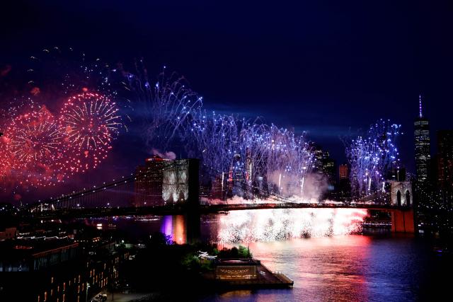 Fireworks light up the Brooklyn Bridge during the Macy's Fourth of July Fireworks celebration in New York City, on July 4, 2026. (Photo by Leonardo MUNOZ / AFP)