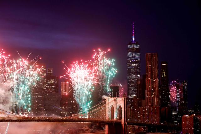 Fireworks light up the Brooklyn Bridge during the Macy's Fourth of July Fireworks celebration in New York City, on July 4, 2026. (Photo by Leonardo MUNOZ / AFP)