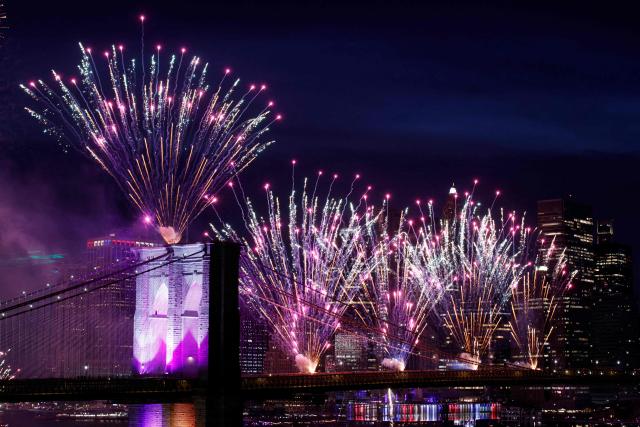 Fireworks light up the Brooklyn Bridge during the Macy's Fourth of July Fireworks celebration in New York City, on July 4, 2026. (Photo by Leonardo MUNOZ / AFP)