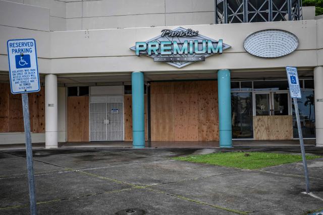 A fitness gym boarded up with plywood is seen as the forecasted Super Typhoon Bavi approaches in Guam, Northern Mariana Islands, on July 5, 2026. (Photo by Yuichi YAMAZAKI / AFP)