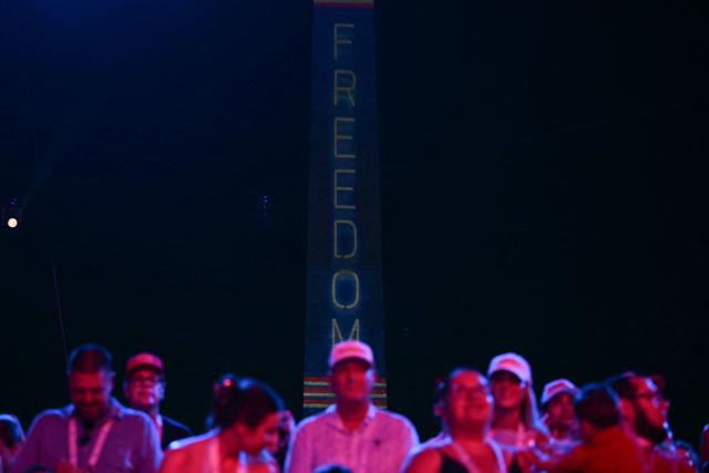 The Washington Monument is illuminated with the word "Freedom" as US President Donald Trump speaks during the "Salute to America" Independence Day celebration on the National Mall in Washington, DC, on July 4, 2026. The nation is marking the 250th anniversary of the United States Declaration of Indpendence. (Photo by Kent NISHIMURA / AFP)